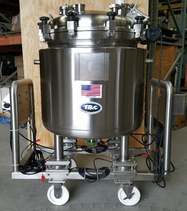 ***SOLD*** used 150 Liter (40 Gal.) Sanitary Stainless Steel Pharmaceutical Reactor/Fermenter.  316L Stainless Steel shell rated 60/Full Vacuum @ 350 Deg.F.  Jacket rated 60/FV @ 350 Deg.F.  Has clamp-on top with hinge.  Has bottom mount for magnetic mixer (mixer not included). Mounted on load cells with Mettler read-out. Includes light source. Unit is mounted on portable cart. 